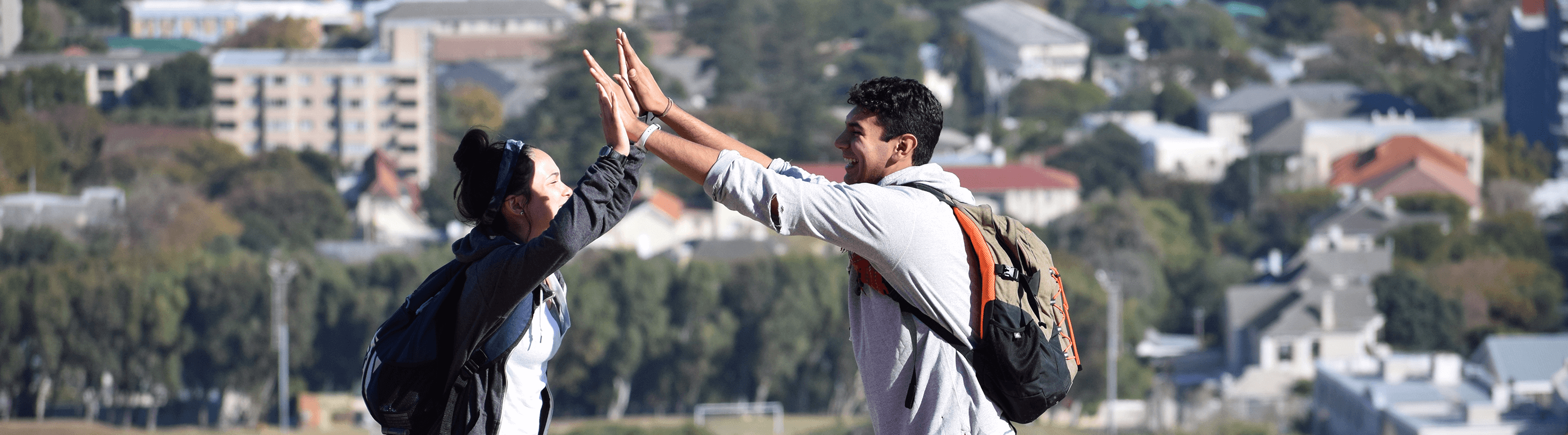 Students high-fiving